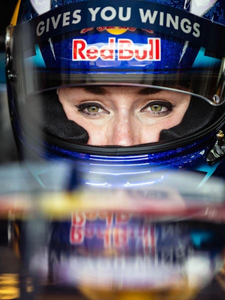 Lindsey Vonn behind the wheel of a Formula One car.