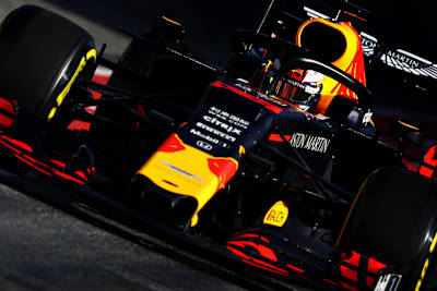A photo of Max Verstappen driving the Aston Martin Red Bull Racing RB15 during F1 Winter Testing at Circuit de Catalunya on March 1, 2019 in Montmelo, Spain.