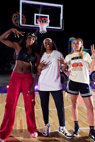 Pictured from left: Flau'jae Johnson, Arike Ogunbowale, Jaden Owens