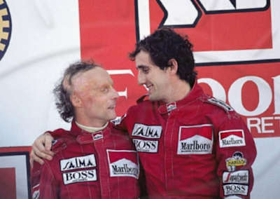 Alain Prost and Niki Lauda in 1984 at Estoril, Portugal.