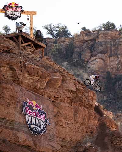 Hayden Zablotny about to drop a huge cliff face at Red Bull Rampage 2025.
