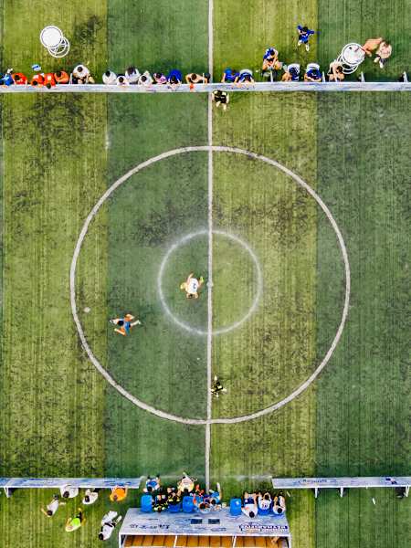From Concrete to Stadiums: The Two Faces of Football