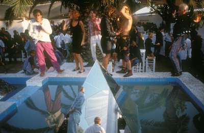 Clubbers dancing outdoors in the Amnesia II courtyard in Ibiza, 1989.