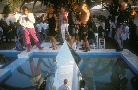 Clubbers dancing outdoors in the Amnesia II courtyard in Ibiza, 1989.