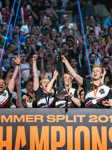 A picture of G2 Esports lifting the LEC trophy.