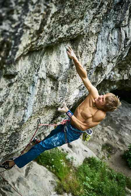 Alex Megos climbs at the Raven Tor in the Peak District National Park, UK