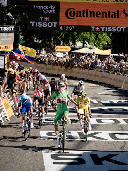 Points Leader Wout van Aert (BEL) wins the finish sprint of Stage 8 into Lausanne, in Switzerland, of the 2022 Tour de France.