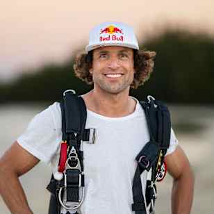 Sebastian Alvarez, poised during the Red Bull Aerial Performance Camp at West End Point, Bahamas. Captured on March 6, 2025, showcasing expert skydiving gear and enthusiasm.
