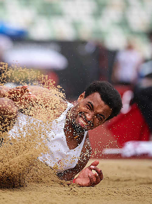 German decathlete Leo Neugebauer participating in the long jump. 