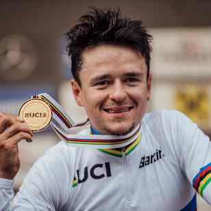 Thomas Pidcock poses with the gold medal at UCI XC World Championships in Leogang, Austria on October 9th, 2020.