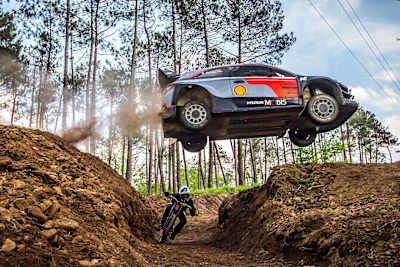 A photo of WRC driver Dani Sordo jumping over downhill MTB star Andreu Lacondeguy in the film Fast Encounter.