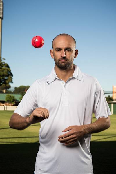 Australian off-spin bowler Nathan Lyon with the pink Kookaburra cricket ball.