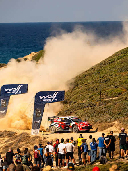 Elfyn Evans and Scott Martin drive through a dusty coastal Wolf Power stage at the World Rally Championship in Alghero, Italy, in October 2026