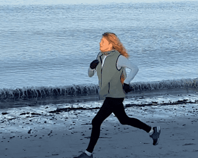 Bobbi Gibb of the USA changed history when, as a 23-year-old in 1966, she became the first woman to run the entire Boston Marathon course, and she is still running, seen here on a beach at age 80.