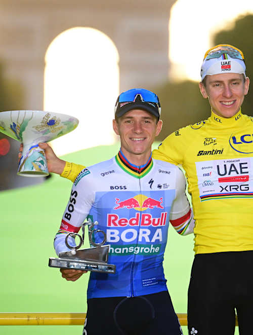 Remco Evenepoel on the podium at the Tour de France in Paris
