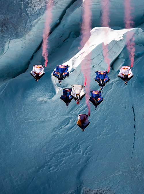 Fred Fugen, Dani Roman, Marco Waltenspiel, Sebastian Alvarez, and others fly in wingsuits above Mont Blanc, France