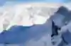 Climbing with an ice axe.