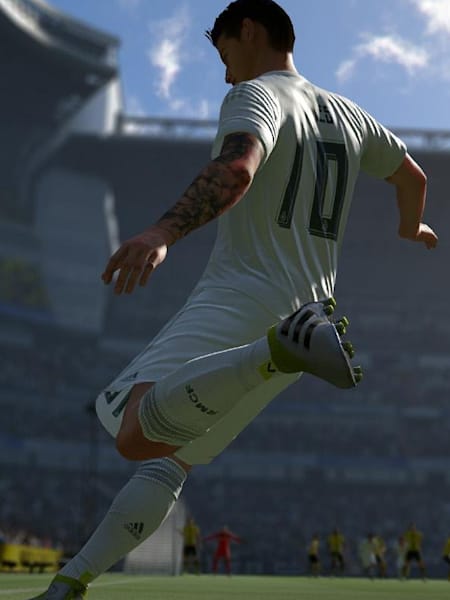 Real Madrid’s James lines up for a corner