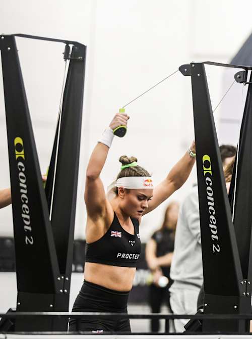 HYROX athlete Lucy Procter powering through the SkiErg station.