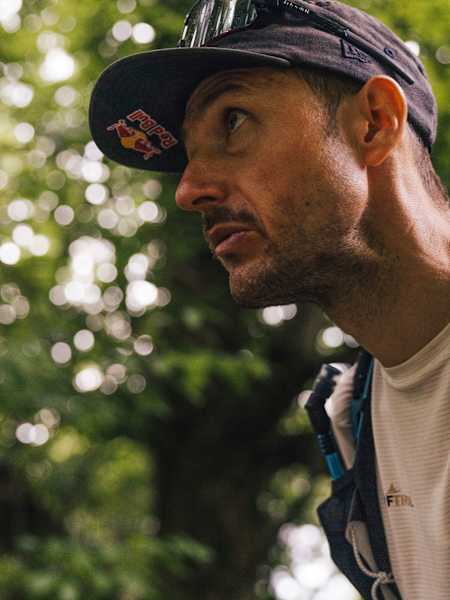 Aaron Durogati hiking during Red Bull X-Alps 2025
