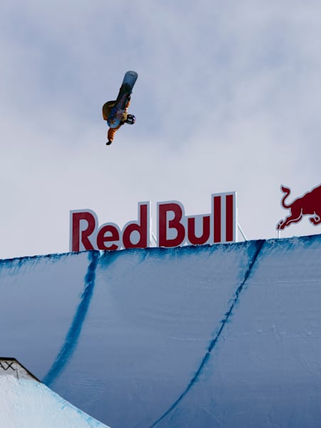 Japanese snowboarder Hiroto Ogiwara lands a gravity-defying snowboard trick at the Laax Open in 2024
