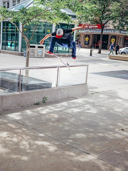 TJ Rogers bangs out a nollie 360 flip in downtown Toronto.