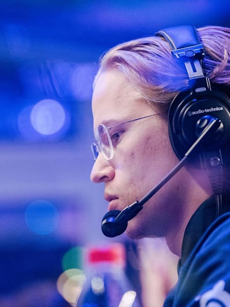 A photo of Topson competing with OG at The International 2019 in Shanghai, China.