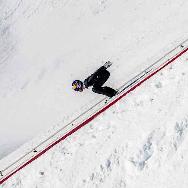 Ryoyu Kobayashi of Japan showcases exceptional skill on the snowy slopes of Akureyri, Iceland, during a thrilling event on April 24, 2024