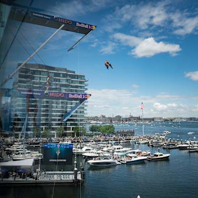 Catalin Preda of Romania dives from the 27.5 metre platform on the Institute of Contemporary Arts building during the 2024 Red Bull Cliff Diving World Series in Boston, USA on June 8, 2024.