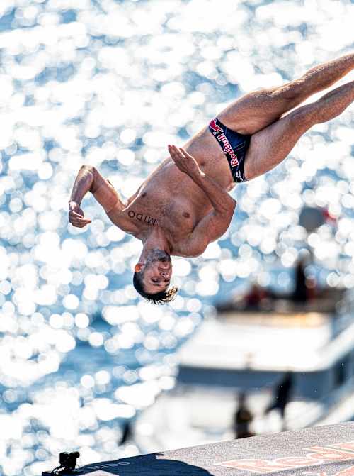Aidan Heslop dives from the 27m platform during the Red Bull Cliff Diving World Series event in Antalya, Turkey in 2024.