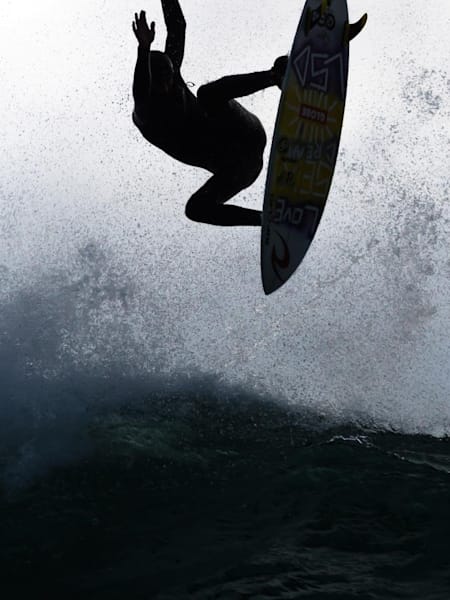 Surfer Noah Wegrich gets airborne whilst surfing in Chile, South America whilst filming for the video series Chasing the Shot