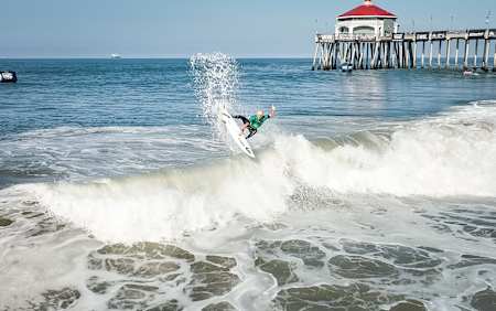 Mateus Herdy surfing at the Vans US Open in Huntington Beach, California