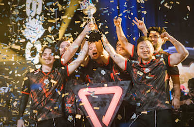 G2 Esports celebrate their Red Bull Home Ground World Finals championship in New York City in November 2025, lifting the trophy amid a shower of confetti.