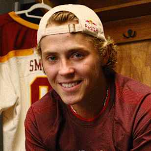 Ice hockey pro Will Smith of the San Jose Sharks poses for a portrait photo in the locker room of Boston College.