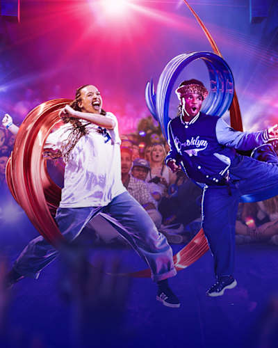 An enhanced image of two dancers performing for a crowd at Red Bull Dance Your Style.