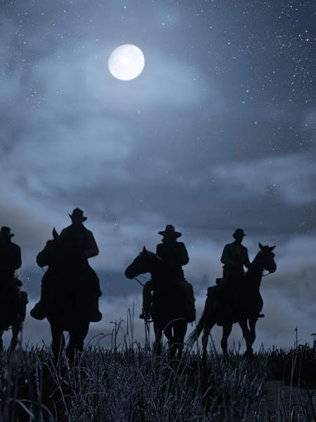 Screenshot of Red Dead Redemption 2 showing cowboys on horses