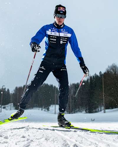 Estonian athlete Kristjan Ilves skis during a Nordic ski photoshoot in snowy Otepää, Estonia, on January 13, 2023.