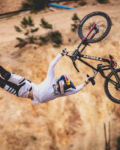 Emil Johansson flies through the air at Green Hill Bikepark, Schmallenberg, Germany, in 2022.