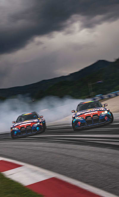 Elias Hountondji und Joe Hountondij fahren ihre neuen BMW M4 Drift-Autos am Red Bull Ring in Spielberg, Österreich.