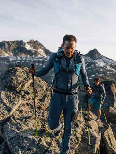 Simon Oberrauner climbs Pazolastock at sunrise at Red Bull X-Alps 2025