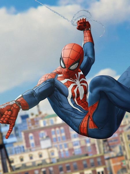 Spider-Man swings between buildings in a screenshot from Marvel’s Spider-Man game.