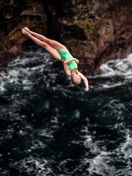Eleanor “Ellie” Smart takes the leap during a training session for the Red Bull Cliff Diving World Series in Ireland last year.