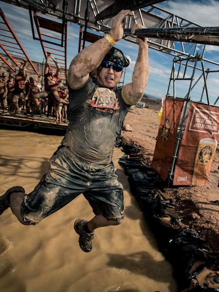 A participant takes part in the Tough Mudder race in the USA.