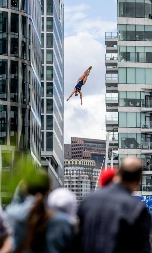 Morgane Herculano of Switzerland dives from the 20.5 metre platform on the Institute of Contemporary Arts building at the 2024 Red Bull Cliff Diving World Series in Boston, USA on June 8, 2024.