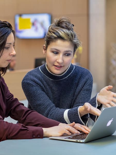 A photo of Tribalingual’s Inky Gibbens and a Tribalingual customer