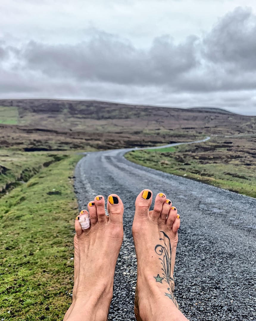 running barefoot on road