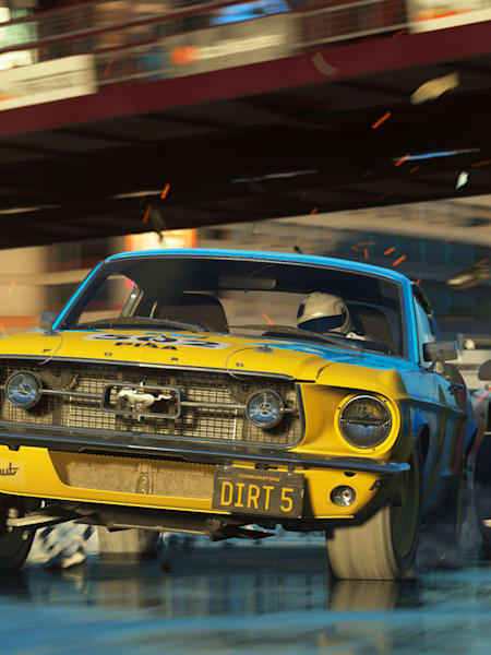 Screenshot of vehicles racing under a bridge in New York in DiRT 5