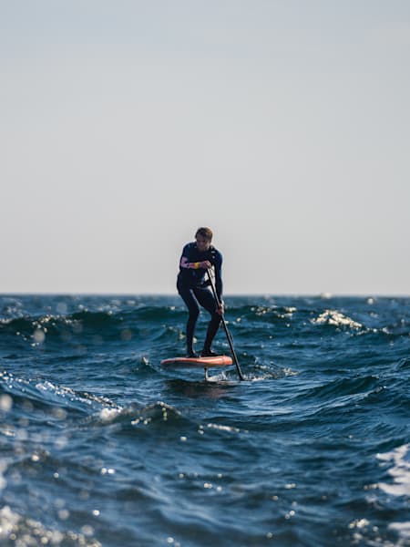 Stand-up paddleboarder Casper Steinfath during his hydrofoil SUP expedition across the Kattegat from Denmark to Sweden.