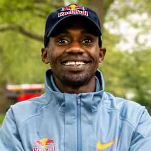Jacob Kiplimo poses with arms folded for a portrait in Hyde Park, London, UK in April 2026