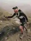 Christian Meier runs up a mountain path